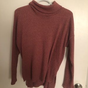 Long sleeved relaxed turtle neck